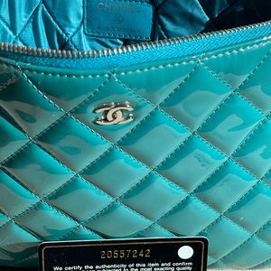 CHANEL quilted patent O-case beautiful color